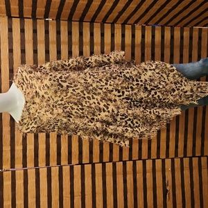 Furry leopard poncho